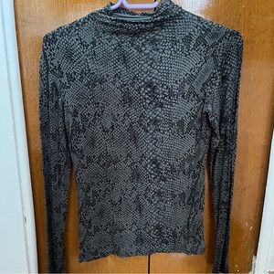 Snake print turtle neck